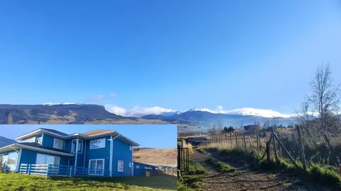 Panoramic view of snowy mountains from house