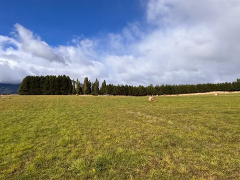 Gravel access road leading into the subdivision