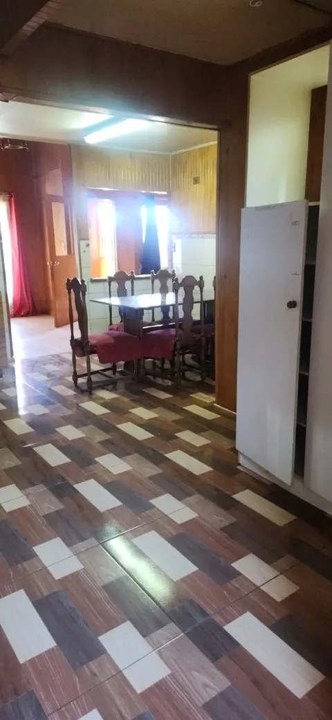 Second bedroom with natural light in a Coyhaique house