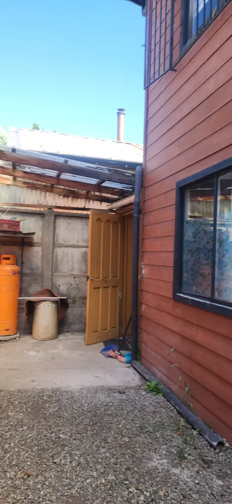 Patio area with outdoor space in a Coyhaique house