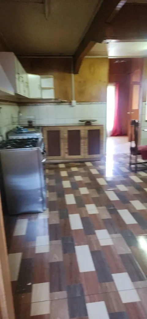 Fourth bedroom with simple furnishings in Coyhaique