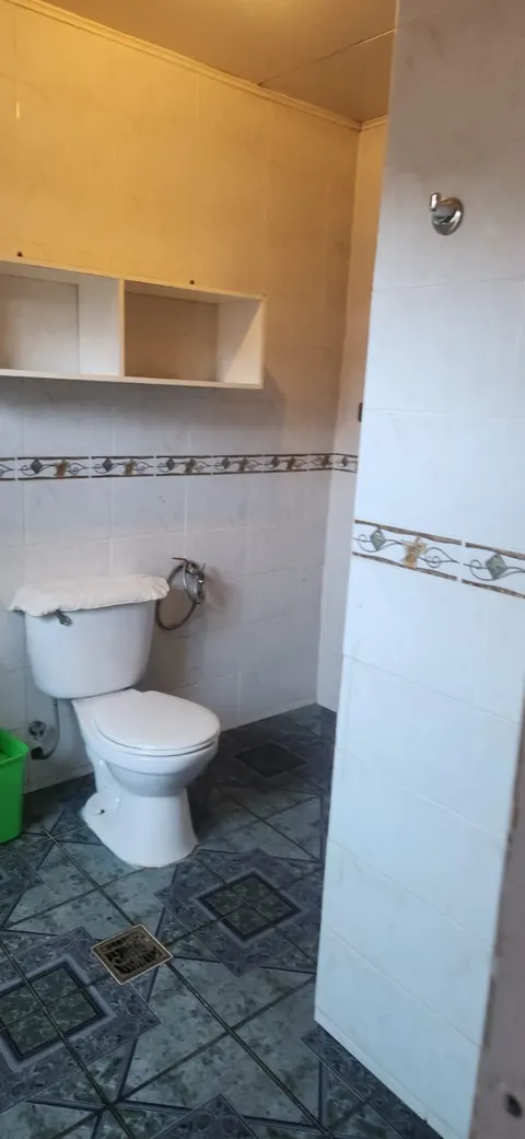 Bathroom with shower and sink in a Chilean home