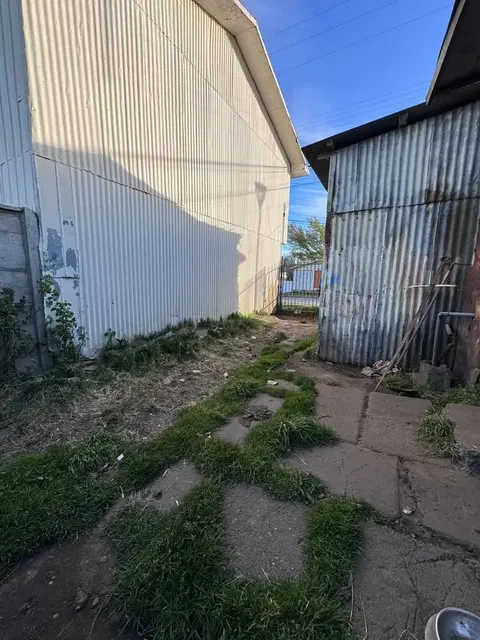 Property entrance door and front yard