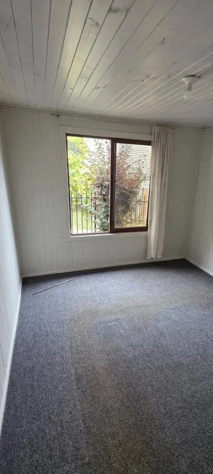 Master bedroom with bed in La Junta house