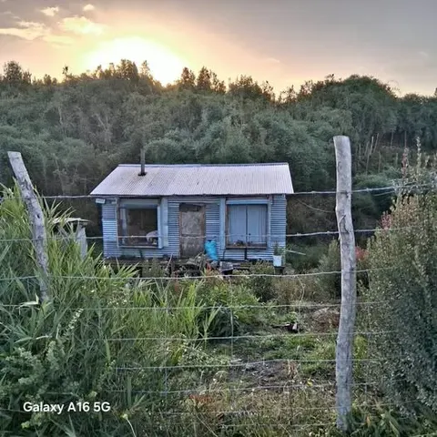 Side view of the house showing land in Cochrane