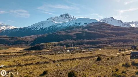 Open land with mountain backdrop on the property
