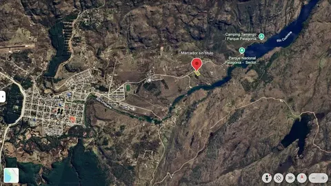 Aerial view of 0.5 hectare parcel near Cochrane River and Tamango Park