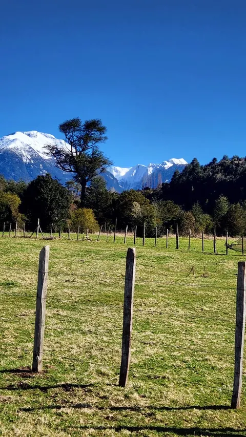 Access road to the parcel with mountain backdrop