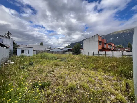 Side view of the lot with neighboring buildings