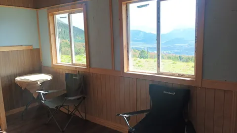 Spacious bedroom inside the cabin with natural light